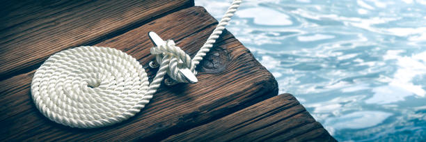istock Coiled Boat Rope Secured To Cleat 1323195206