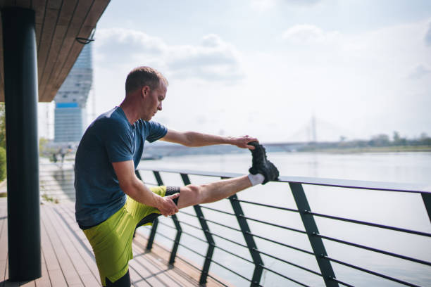 istock Young man relaxes before heading out on morning run 1323205459