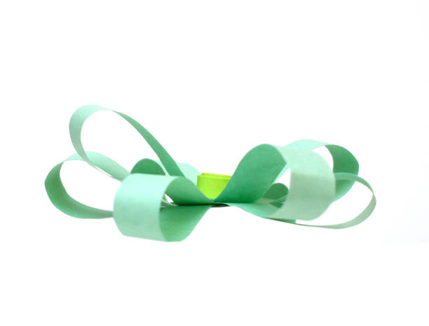 istock A green blooming origami paper head isolated white 1323207201