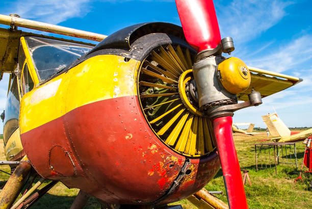 Pilot preparing an ultralight plane for a flight