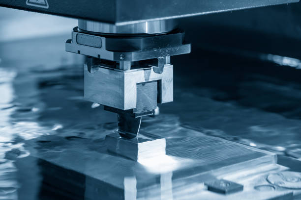 istock The operation of EDM machine with graphite electrode materials. 1323208168