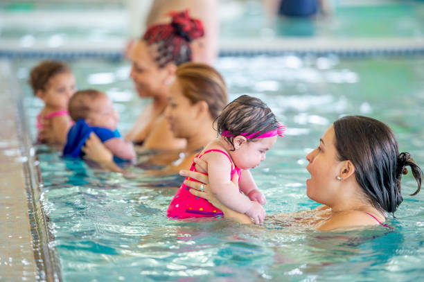 istock Mommy and me swimming class 1323208851