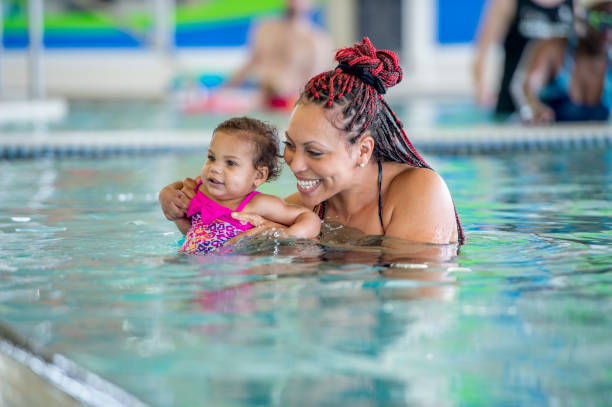 istock Mommy and me swimming class 1323208858