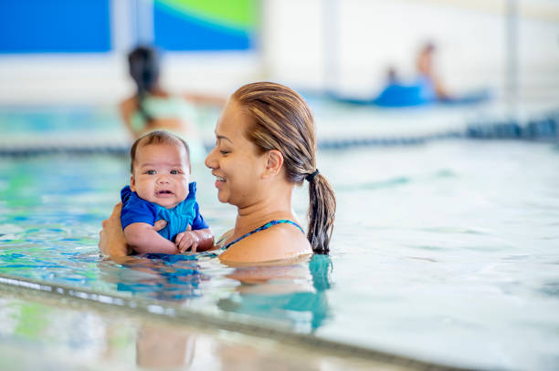 istock Mommy and me swimming class 1323208862