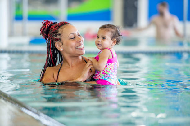 istock Mommy and me swimming class 1323208864