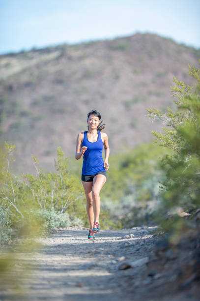 istock Active woman in the mountains 1323209211