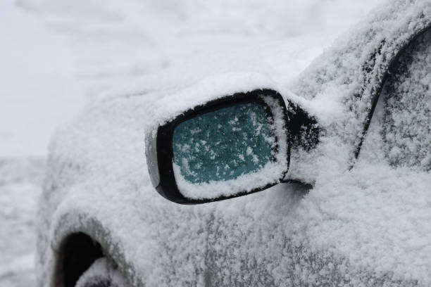 istock Snow covered car in winter. 1323209306