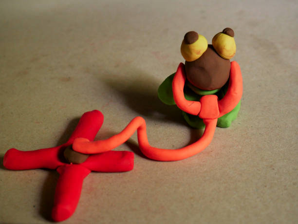 istock Hand made clay art toys with concepts 1323210039