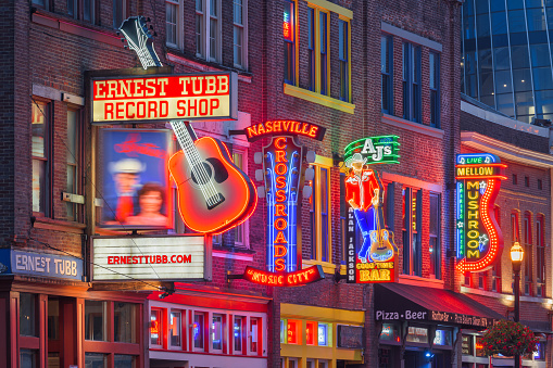 Nashville, Tennessee, USA - August 20, 2018: Honky-tonks on Lower Broadway. The district is famous for the numerous country music entertainment establishments.