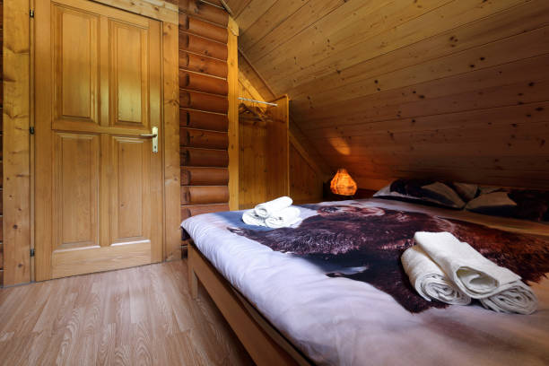 istock Bedroom in a log cabin 1323211396