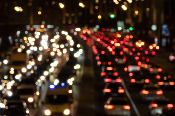 istock Blured car lights at night. Rush hour in the city 1323214330