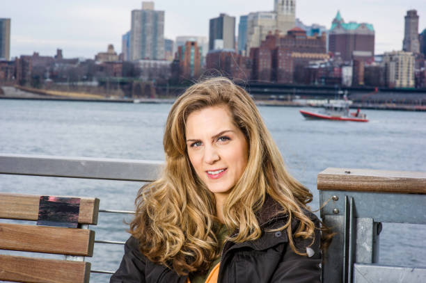 istock Young Woman Relaxing Outside 1323221812