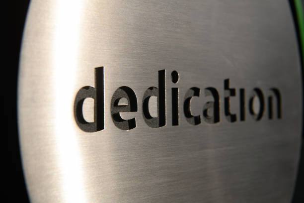 istock engraving a cnc machine on a piece of metal. Engraving dedication text 1323222027