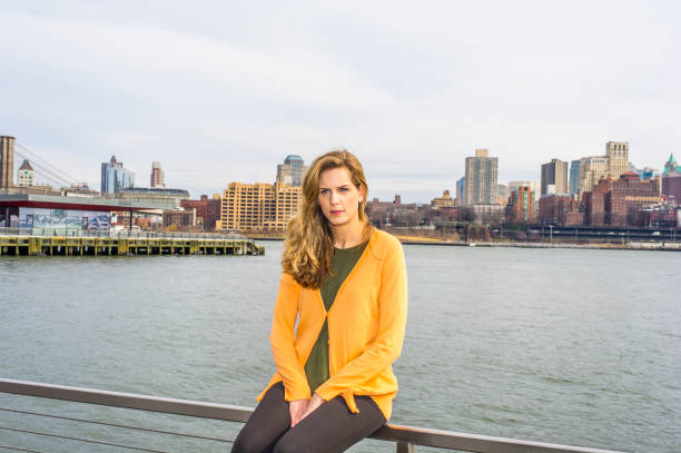 istock Young Woman Relaxing Outside 1323222065