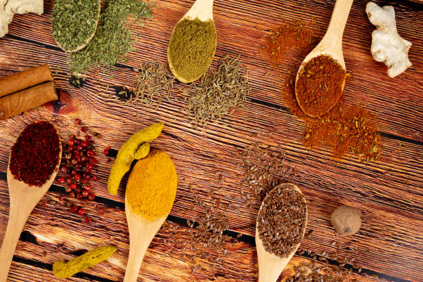 istock Spices and Herbs on Wooden Table. 1323223850