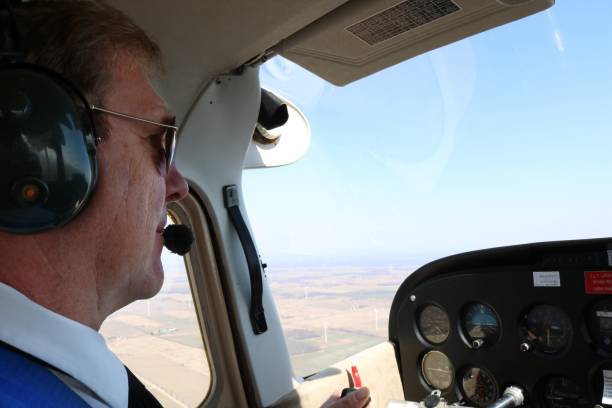 istock Cose-up of man flying an airplane 1323225253