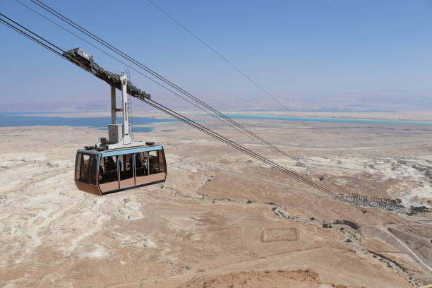 Cable car in Masada Seen on the Masada cable car. Dead sea in the background. dead sea scrolls stock pictures, royalty-free photos & images