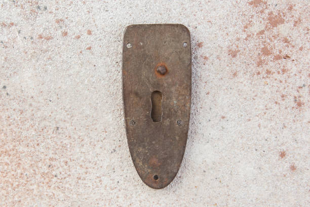 istock Antique brass keyhole lock cover 1323231816