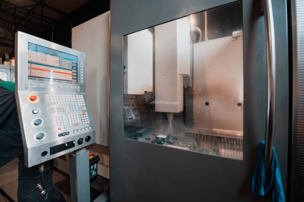 istock machine control panel CNC with the image of the details on the screen 1323232871