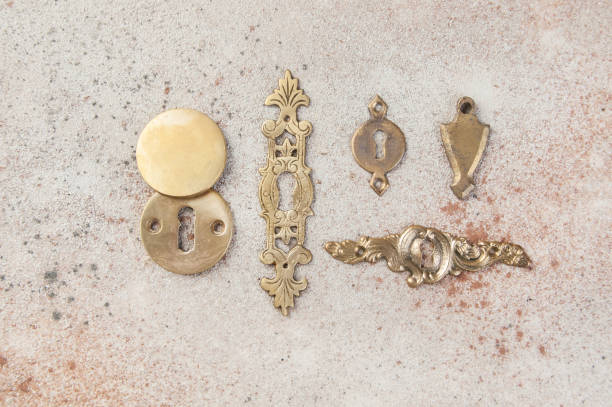 istock Antique brass key holes cover 1323233052