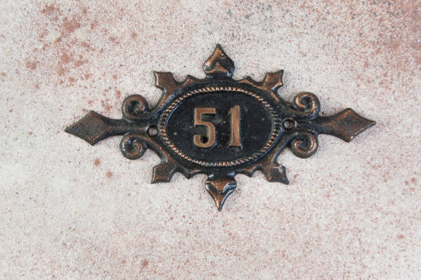 istock Old metal home number sign 1323233710
