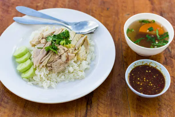Photo of Thai Khao Man Gai, rice with chicken at street restaurant