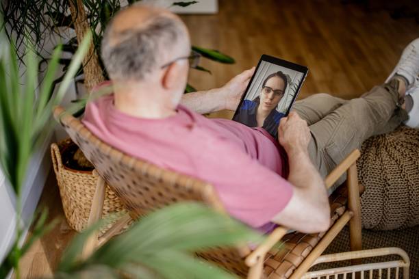 istock Father talking to his daughter on father’s day using video call 1323234147
