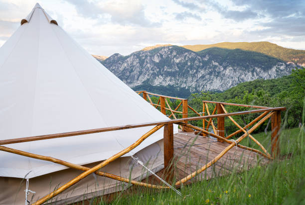 istock glamping tent detail with mountain range panorama 1323234725