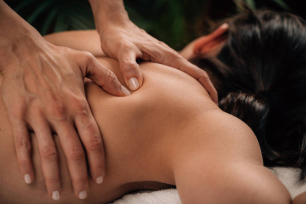 istock Woman Enjoying Deep Tissue Massage 1323235015