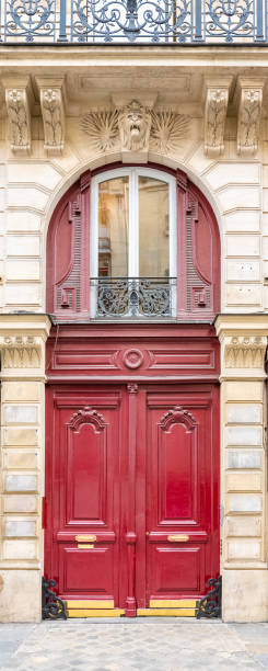 istock Paris, an ancient wooden door 1323235079