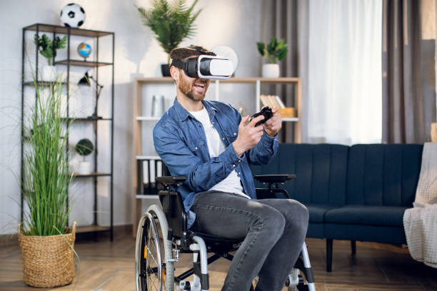 istock Handicapped man in virtual glasses playing games 1323237000