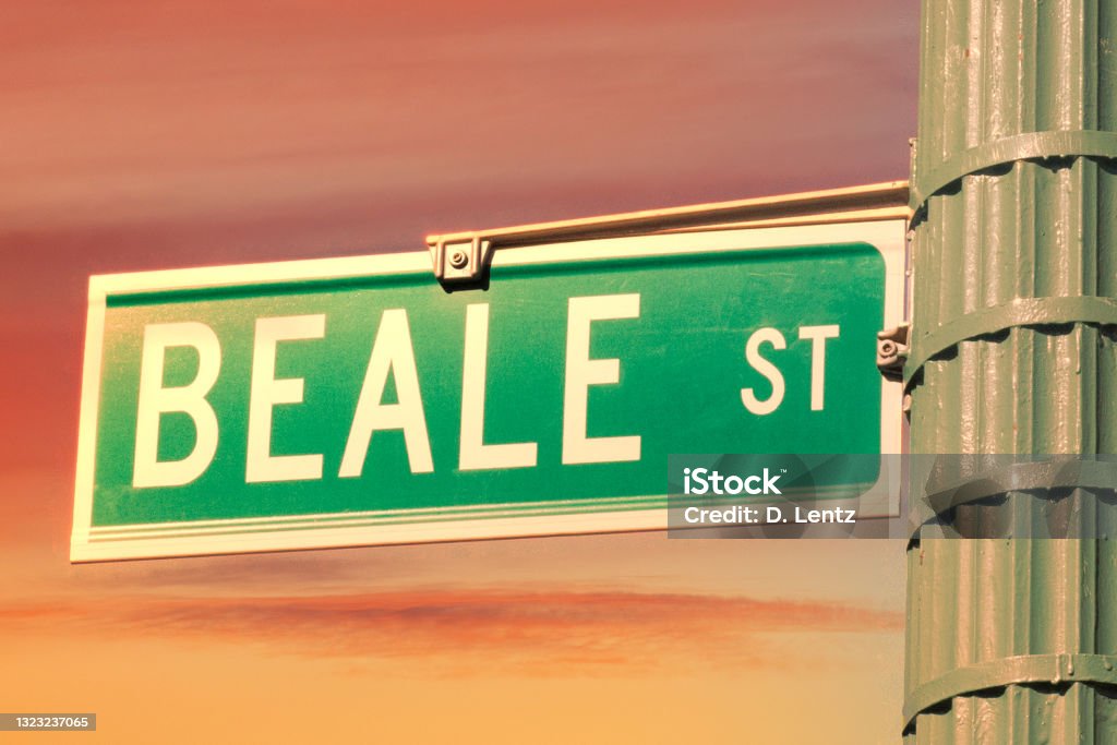 Beale Street Sign A Beale Street Sign in Memphis, Tennessee during a bright orange sunset. Music Stock Photo