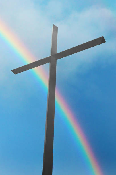 istock Christian Cross with Rainbow 1323237248