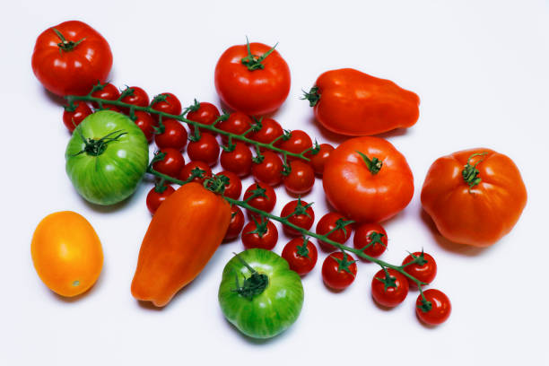 istock heirloom tomatoes also known as heritage tomatoes in a white background 1323238410