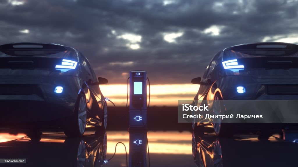 Electric cars charging at a charging station. 3d rendering Electric cars charging at a charging station. 3d rendering. Electric Car Stock Photo