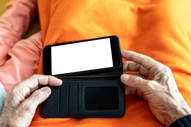istock Great Grandfather And Great Granddaughter Using Smartphone 1323252350