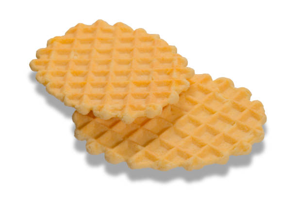 istock Two round baked sweet waffles isolated on a white background 1323253169