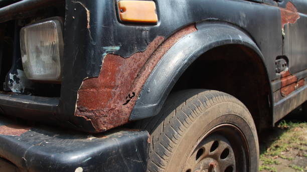 istock Broken part of car body with rusty. Close up old rusty car 1323253232