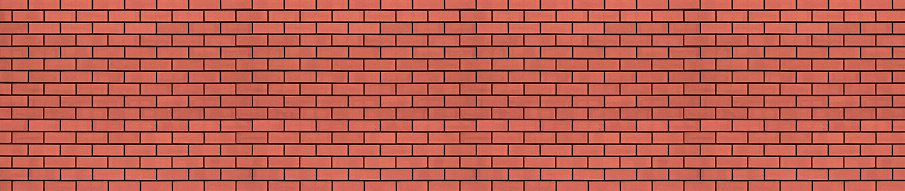Long red brick wall. Abstract background for design. Backdrop for text. Panorama. Copy space.