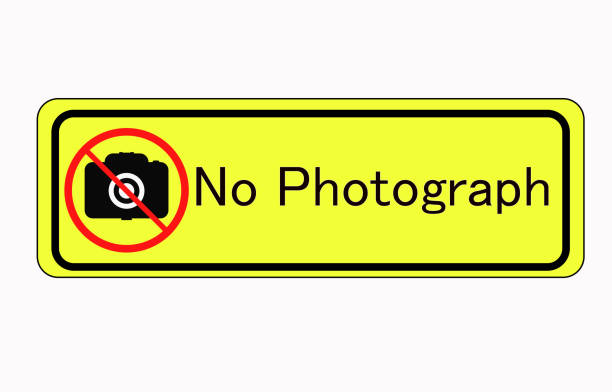 NO CAMERAS ALLOWED sign. Flat icon in red crossed out circle. NO CAMERAS ALLOWED sign. Flat icon in red crossed out circle. no photographs sign stock illustrations