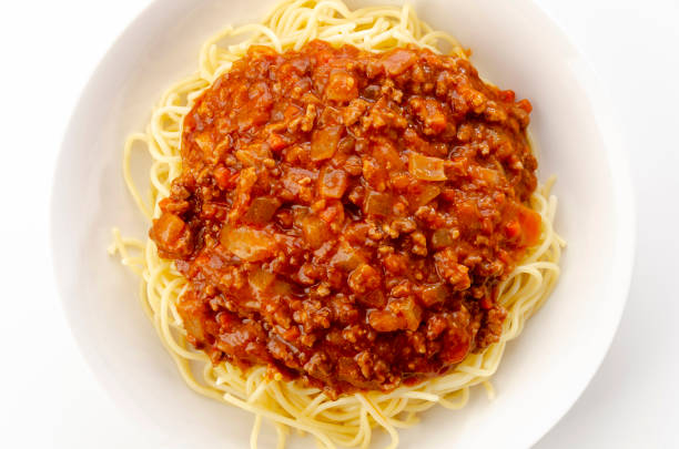 istock spaghetti with meat sauce on a white background 1323260786