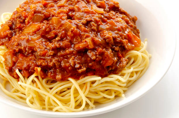 istock spaghetti with meat sauce on a white background 1323260820