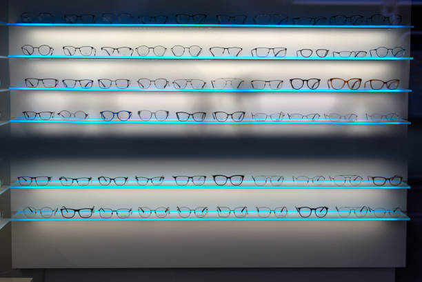 istock Colorful illuminated spectacle frames at glasses shop. 1323280515