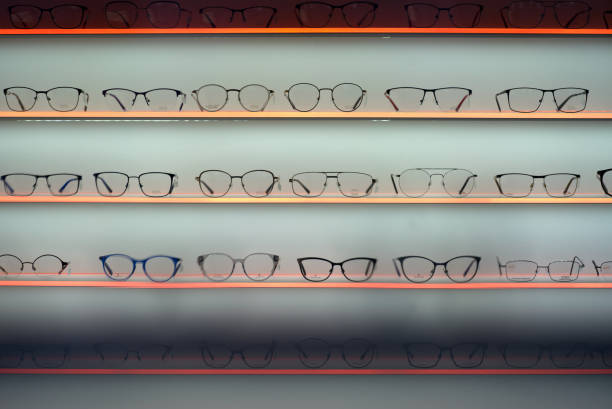 istock Colorful illuminated spectacle frames at glasses shop. 1323280549