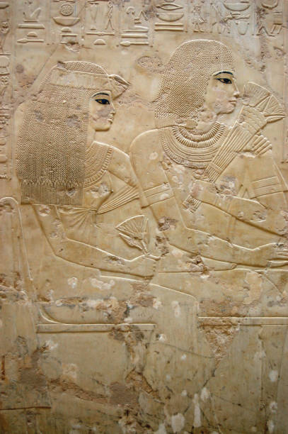 istock Beautiful married couple, Ancient Egyptian bas relief 1323282212