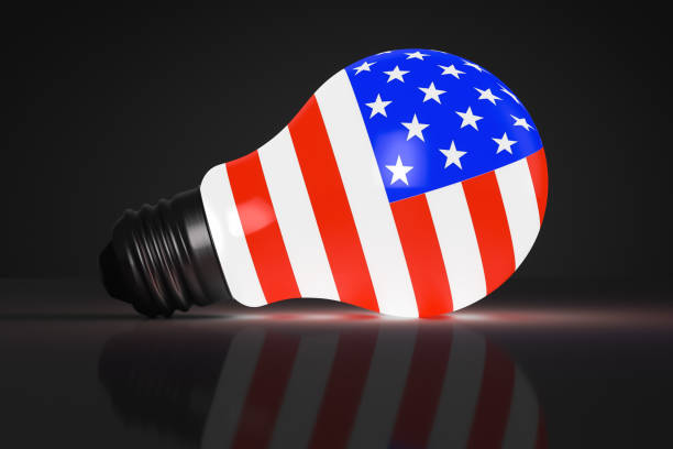 istock Glowing light bulb with US symbols. Political themes 1323288291