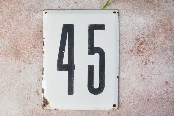 istock Old house number sign 1323288519