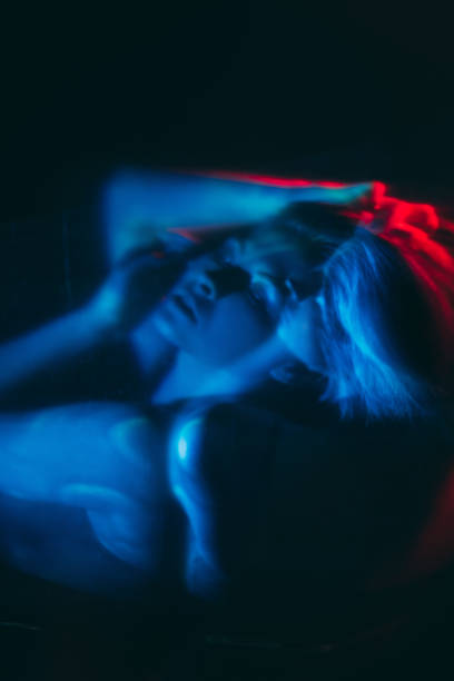 istock nightmare anxiety dark silhouette disturbed woman 1323294973