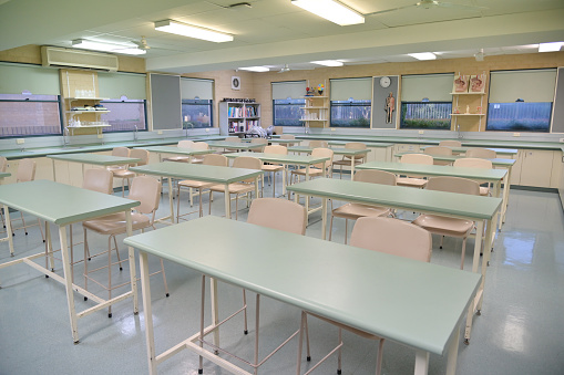 An empty high school science lab classroom.