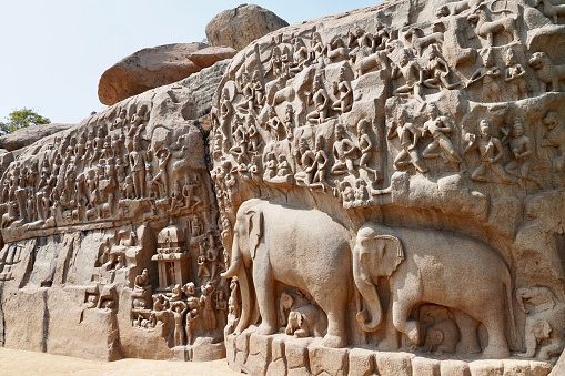 Stone carved ancient mythological sculptures in the granite rock boulders in Tamilnadu.